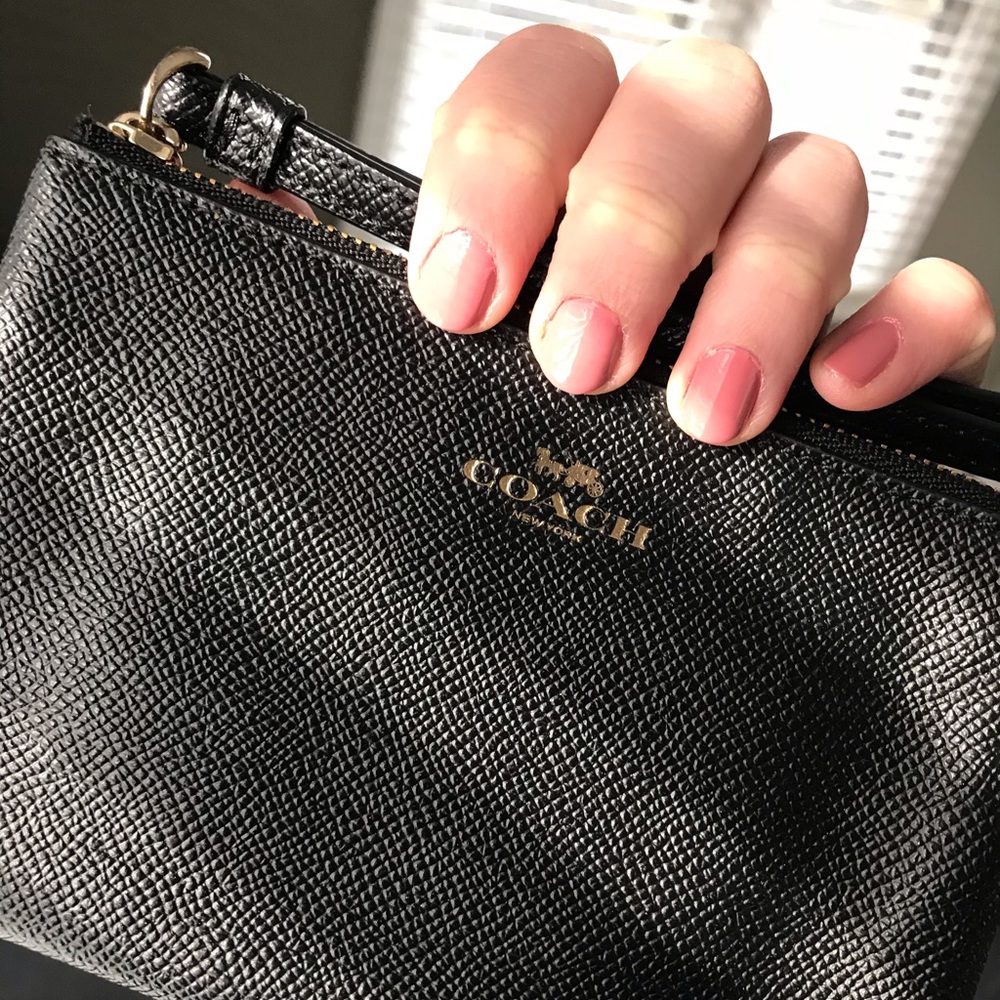 NOWT Black Coach wristlet with gold hardware